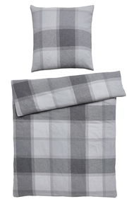 Bettwäsche-Set in Grau- und Weißtönen mit Karomuster, bestehend aus einem Kissenbezug und einem Bettdeckenbezug, aus der Vogelperspektive fotografiert.