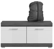 Garderoben-Set mit zwei weißen Schubladen und einer dunklen Holzoberfläche, darauf ein schwarzer Rucksack, frontale Perspektive