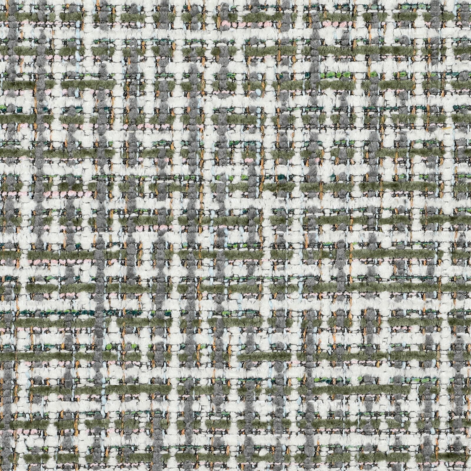 Nahaufnahme eines strukturierten Stoffmusters in einem geometrischen Design mit grünen, weißen und grauen Tönen.