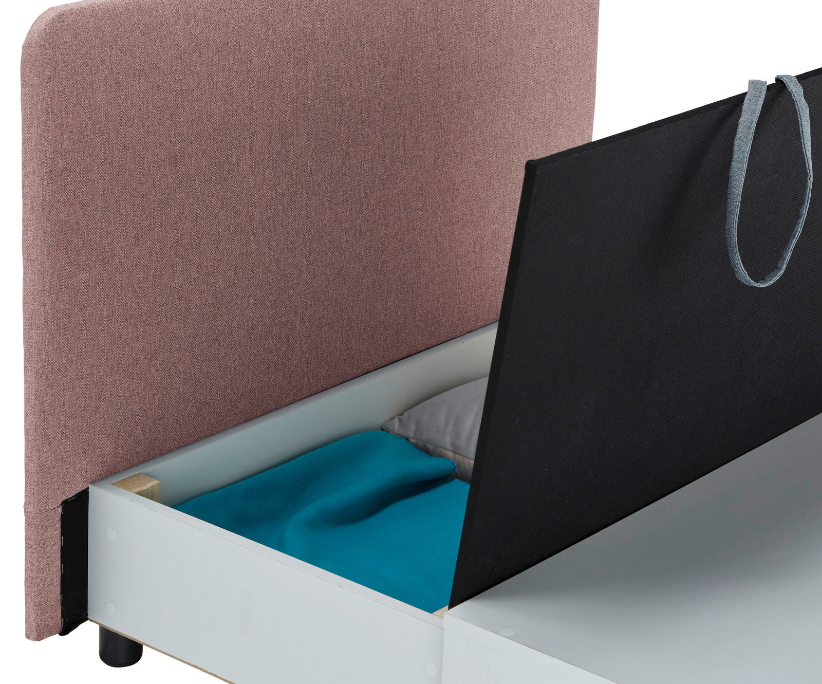 Nahaufnahme eines Funktionssessels mit Stauraum, geöffnet, mit einem blauen Kissen und einem grauen Kissen. Perspektive von oben.