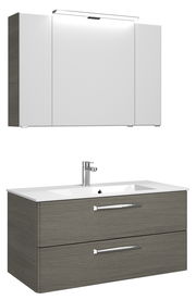 Moderner Badblock mit Spiegelschrank und Waschbeckenunterschrank in Holzoptik, seitliche Perspektive