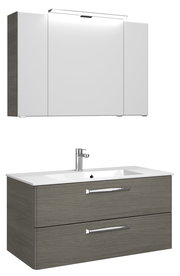 Moderner Badblock mit Spiegelschrank und Waschbeckenunterschrank in Holzoptik, seitliche Perspektive