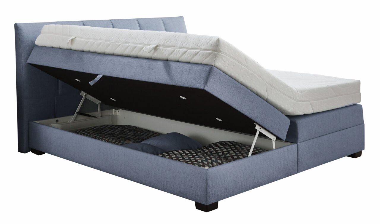 Boxspringbett mit geöffnetem Stauraum, seitliche Perspektive