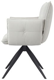 Seitenansicht eines modernen Armlehnstuhls mit hellgrauem Stoffbezug und schwarzen Metallbeinen.