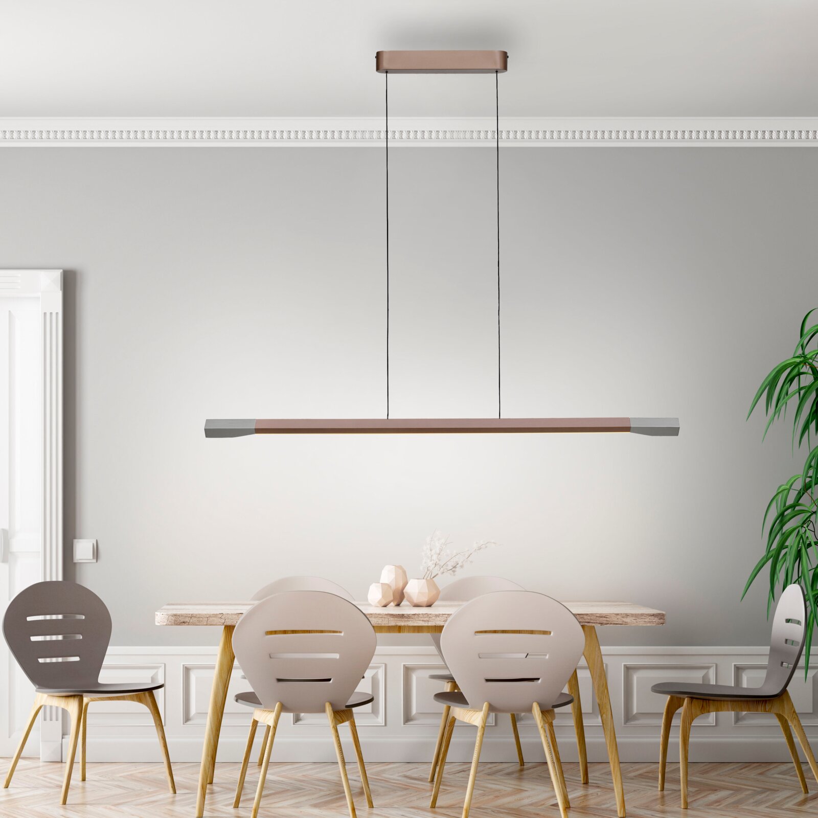 Moderne LED-Pendelleuchte über einem Esstisch, seitliche Perspektive