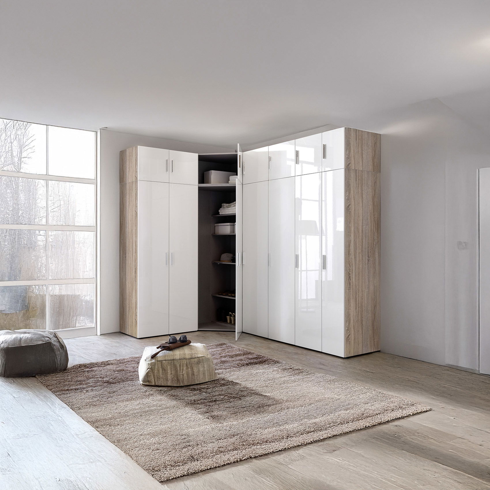 Stylisher Eckkleiderschrank in Weiß Hochglanz und heller Eiche – modernes Design mit viel Stauraum.