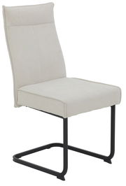 Moderner Schwingstuhl mit beigem Polster und schwarzem Metallgestell, seitliche Perspektive