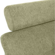 Nahaufnahme einer grünen, texturierten Polsterung eines Sofas mit Rückenlehne, seitliche Perspektive.