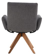 Rückansicht eines grauen Armlehnstuhls mit Holzbeinen, Modell COCOON von Dieter Knoll.