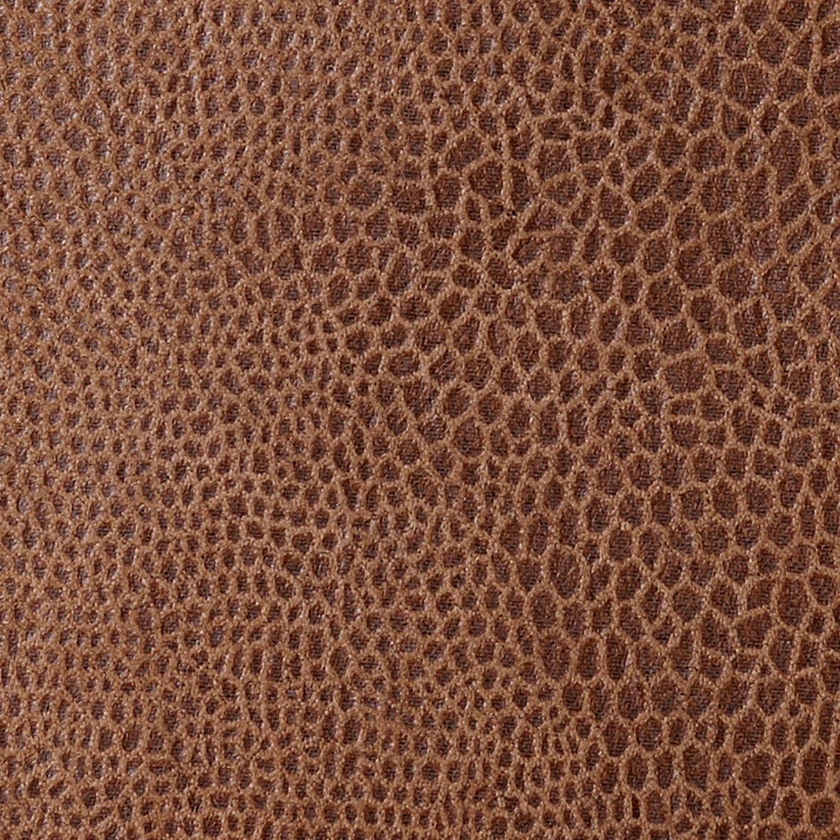 Nahaufnahme des braunen Stoffmusters des Funktionssofas GHIA