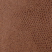 Nahaufnahme des braunen Stoffmusters des Funktionssofas GHIA