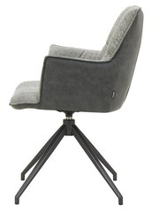 Seitliche Ansicht des Novel Sessels OSAKA 2.0 mit grauem Stoffbezug und schwarzem Metallgestell.