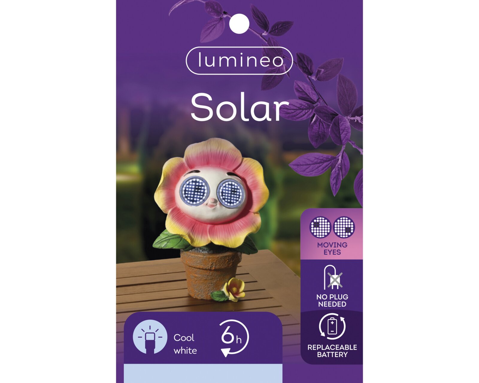 Solarbetriebene Figur in Form einer Blume mit beweglichen Augen, auf einem Tisch stehend, frontal betrachtet.