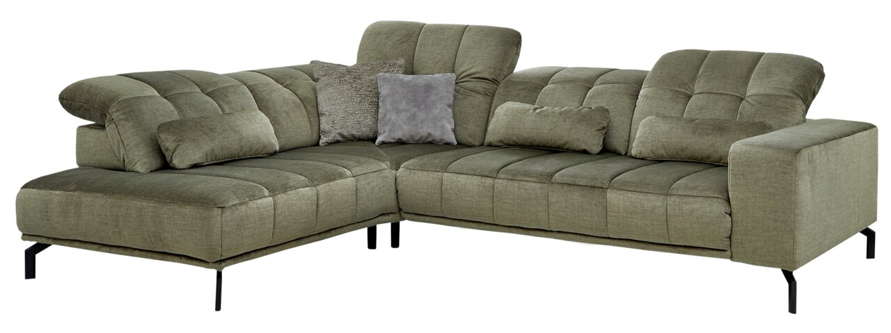 Grüne Eckgarnitur mit mehreren Kissen, aus einer leicht erhöhten Perspektive fotografiert.