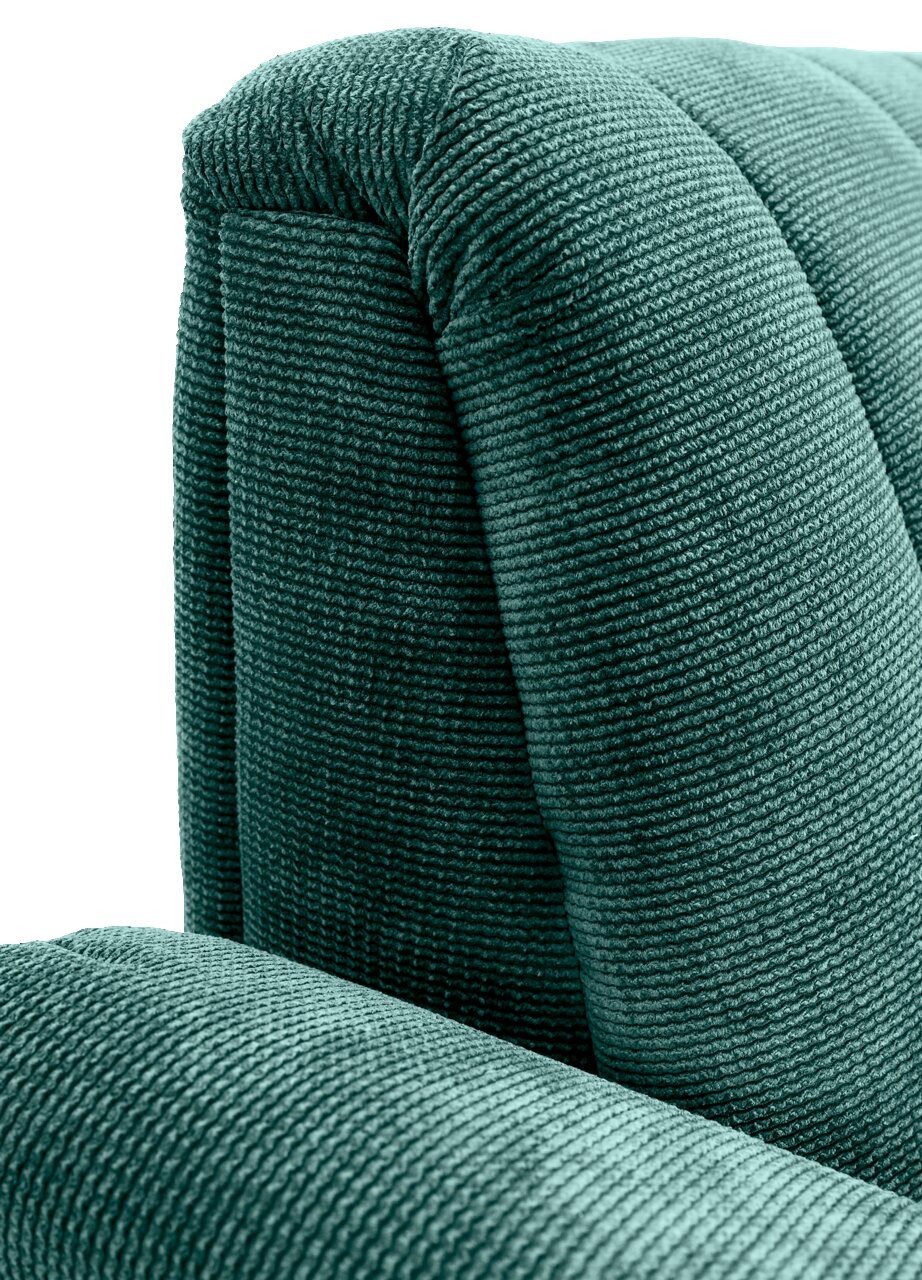Nahaufnahme einer grünen, strukturierten Polsterung eines Sofas, perspektivisch von der Seite aufgenommen.
