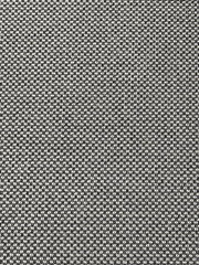 Nahaufnahme eines schwarz-weiß gemusterten Stoffes, der für eine Hochlehnerauflage verwendet wird.