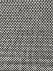 Close-up van een stof met een zwart-witpatroon, die wordt gebruikt voor de bekleding van een hoge rugleuning.