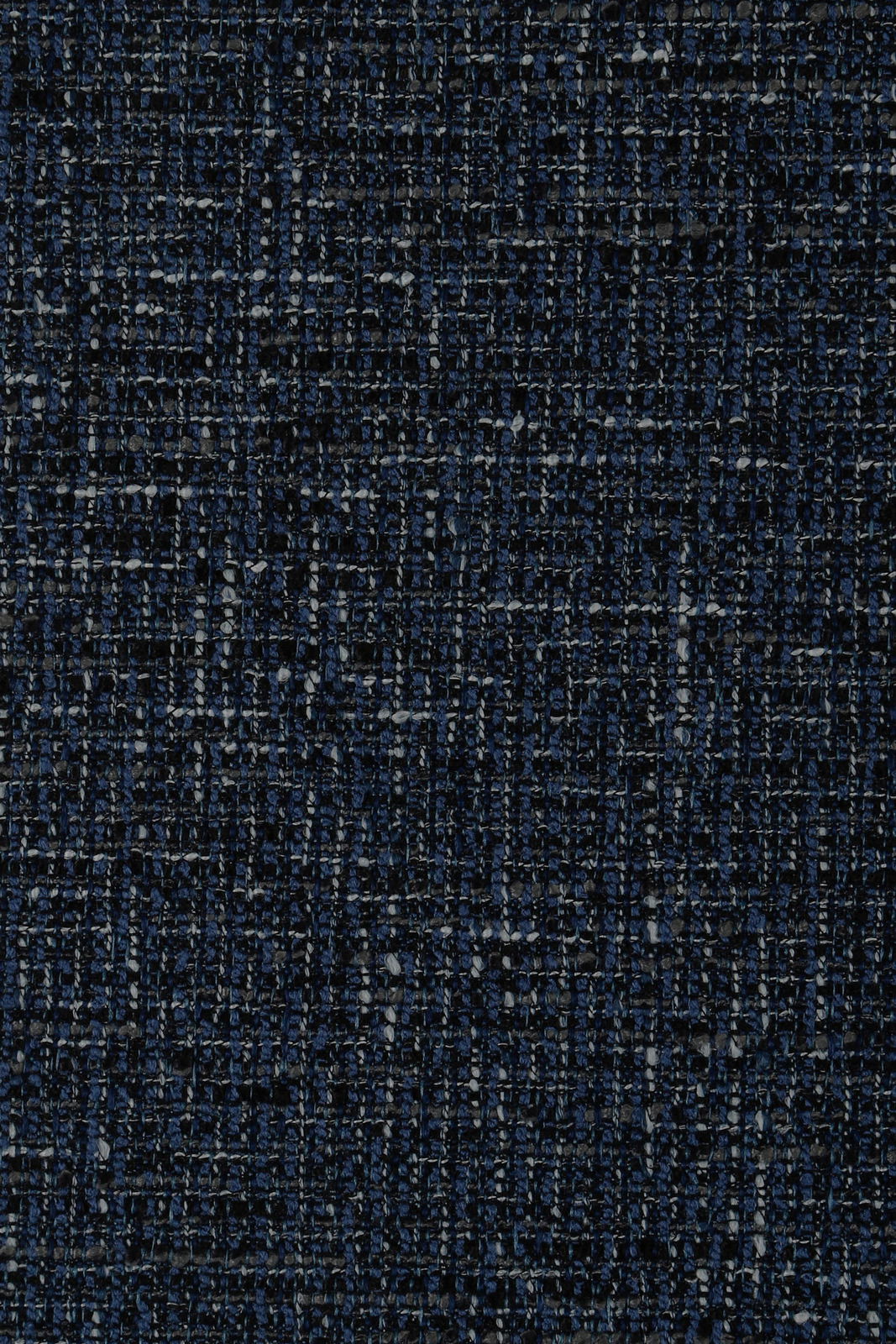 Nahaufnahme eines dunkelblauen, strukturierten Stoffmusters in Draufsicht