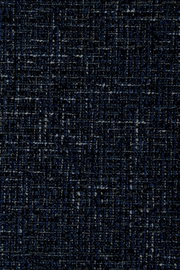 Close-up van een donkerblauw, gestructureerd stofpatroon, gezien van bovenaf