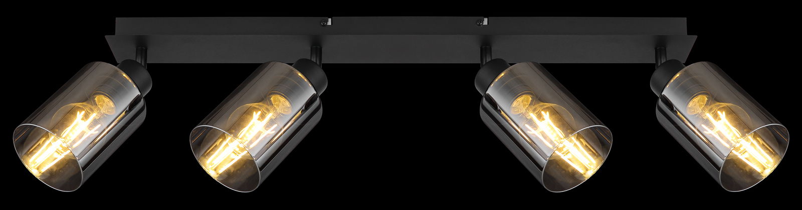 Vierflammiger Strahler aus schwarzem Metall mit mattem Finish, seitliche Perspektive, leuchtende Glühbirnen sichtbar.