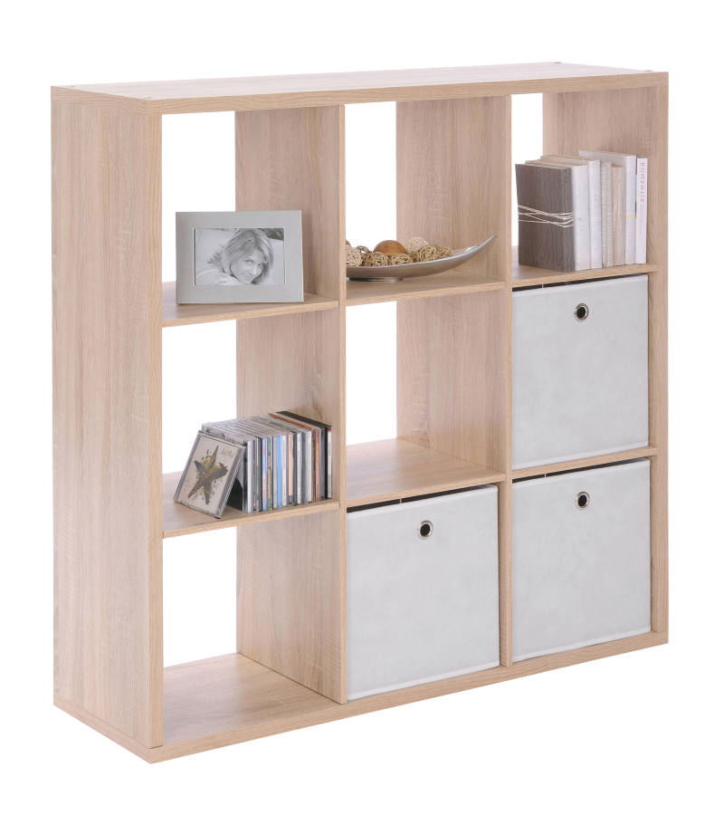 Regalwürfel mit neun Fächern, teilweise mit Büchern, CDs und Aufbewahrungsboxen gefüllt, aus hellem Holz, seitliche Perspektive
