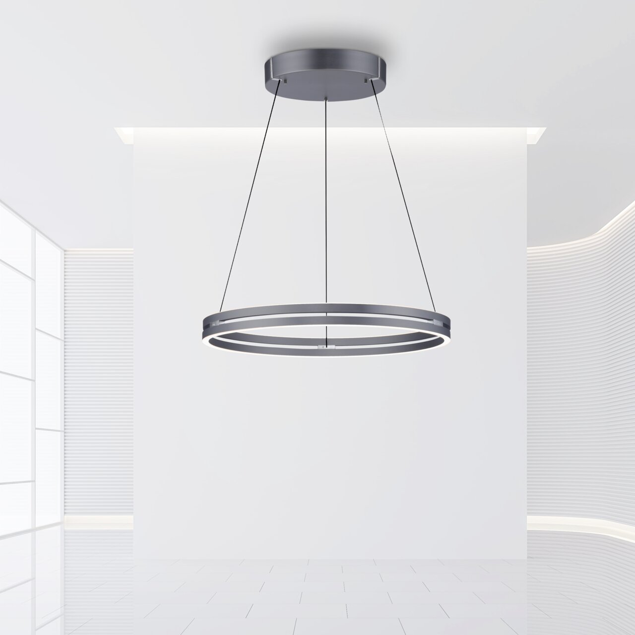 De moderne hanglamp PURE-E-LOOP van Paul Neuhaus in een minimalistische, lichte omgeving, gezien vanuit een zijaanzicht.