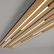 Moderne LED-Deckenleuchte mit Holzlamellen, von unten betrachtet.