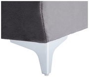 Nahaufnahme einer grauen Rundecke mit weißem Metallfuß, seitliche Perspektive