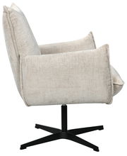 Seitenansicht eines beigen Relaxsessels mit schwarzem Drehfuß