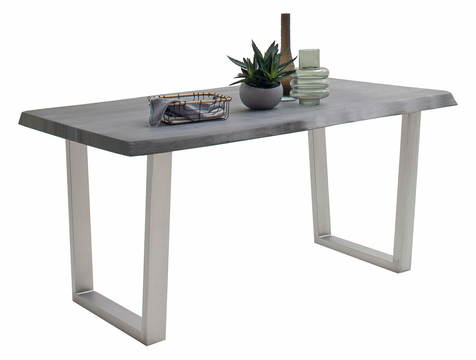 Moderner Esstisch mit grauer Tischplatte und Metallbeinen, seitliche Perspektive