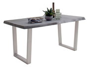 Moderner Esstisch mit grauer Tischplatte und Metallbeinen, seitliche Perspektive