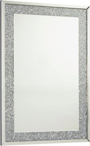 Rechteckiger Spiegel mit glitzerndem Rahmen, perspektivisch von der Seite gezeigt.