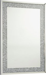 Rechteckiger Spiegel mit glitzerndem Rahmen, perspektivisch von der Seite gezeigt.