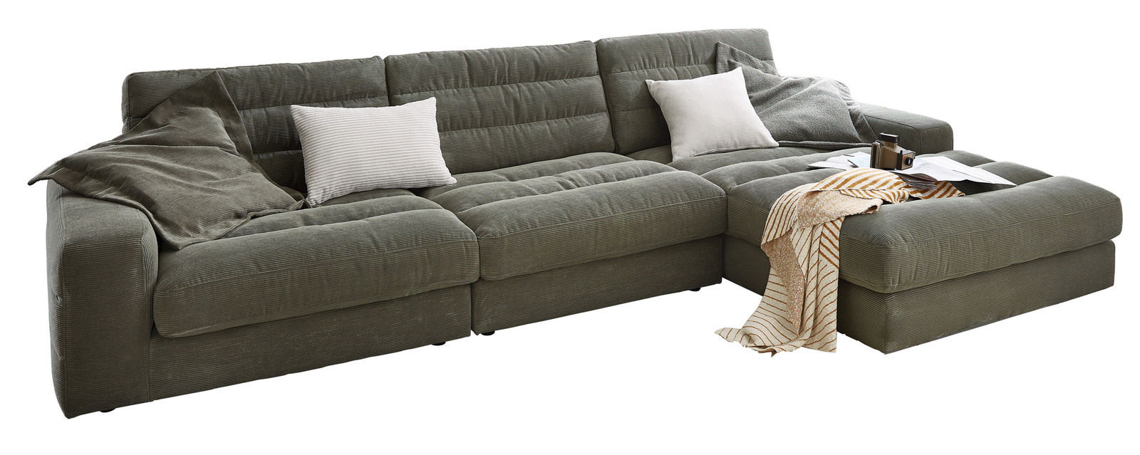 Pure Home Lifestyle Longchairkombination PURE 972 Große, moderne Longchairkombination in grauem Stoff mit Kissen und Decke, seitliche Perspektive.