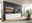 Modernes Wohnzimmer mit Wandboard CORE, bestehend aus zwei hölzernen Regalböden an einer dunklen Wand, dekoriert mit Pflanzen und Büchern, im Hintergrund ein großer Fernseher auf einem weißen Sideboard, seitliche Perspektive.