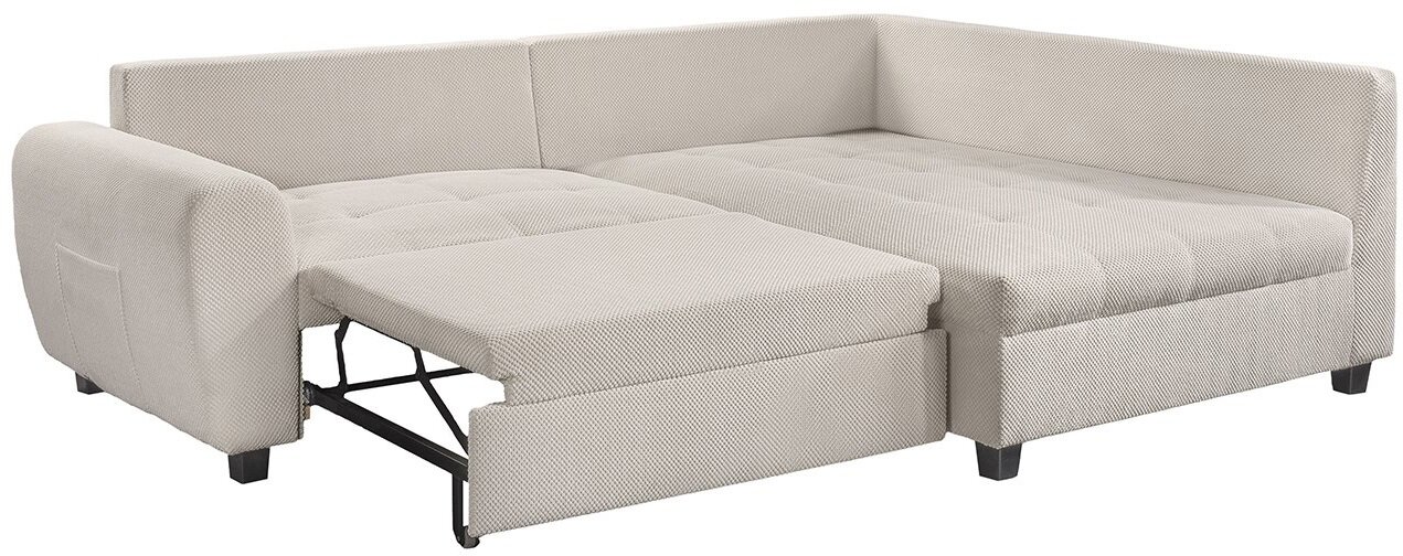 Beige hoekbank met uitschuifbaar bed, gezien vanaf links vooraan