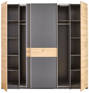 Moderner Dreh- und Schwebetürenschrank mit vier Türen, in Holzoptik und grauen Elementen, frontal abgebildet.