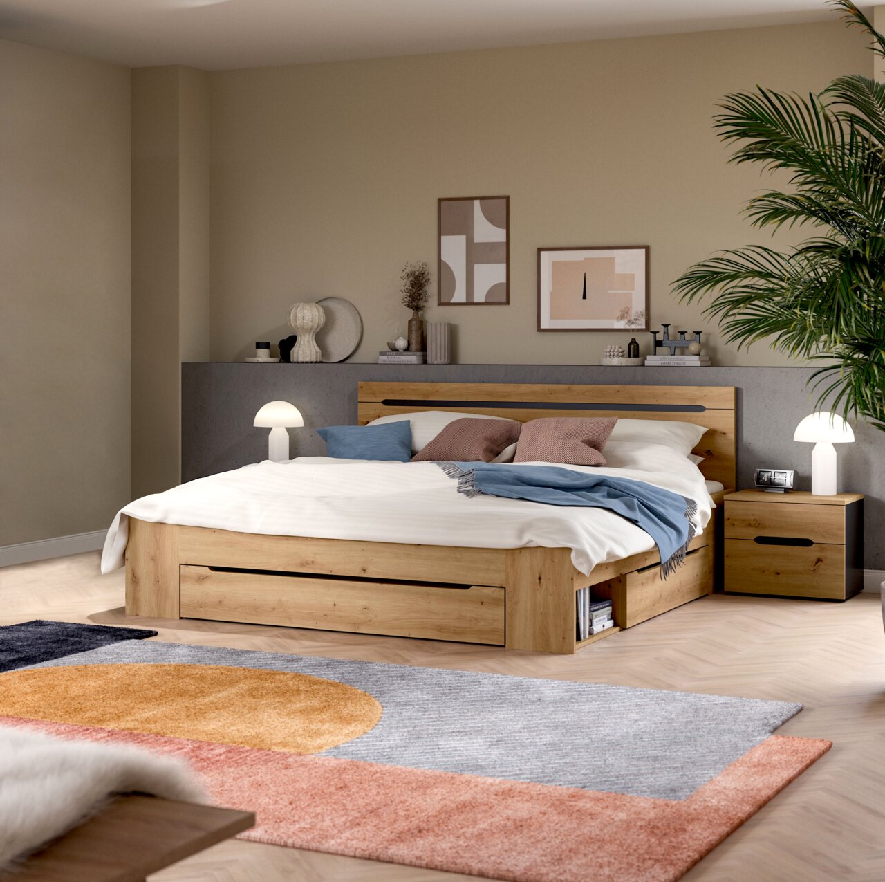 MID.YOU Schlafzimmer-Set CANU Modernes Holzbett in Eiche-Optik mit integriertem Stauraum und Schublade, weißer Bettwäsche und blauen Akzentkissen im Schlafzimmer; Perspektive: frontale Ansicht leicht von links auf das Bett