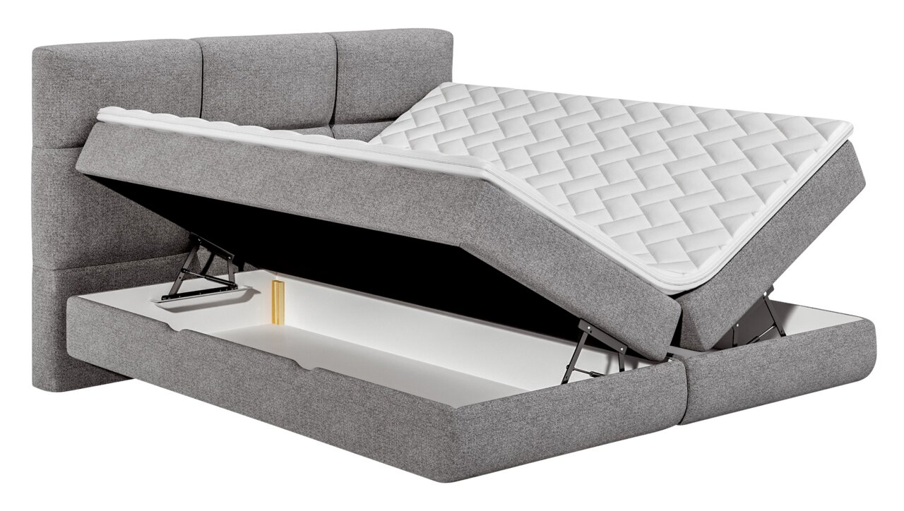Graues Boxspringbett mit geöffneter Matratze und Stauraum, seitliche Perspektive