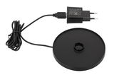 Schwarzes Ladegerät mit Kabel und runder Basis für Akku-Tischleuchte, Ansicht von oben