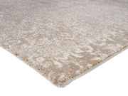 Designer Teppich in Beige- und Cremetönen, Nahaufnahme aus seitlicher Perspektive