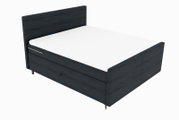 Boxspringbett in dunklem Holzdesign, seitliche Perspektive
