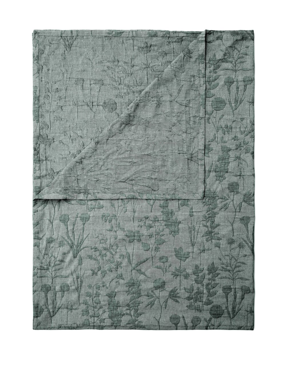Essenza Home MARIBEL Groene plaid met bloemmotieven, uitgespreid en van bovenaf gefotografeerd.
