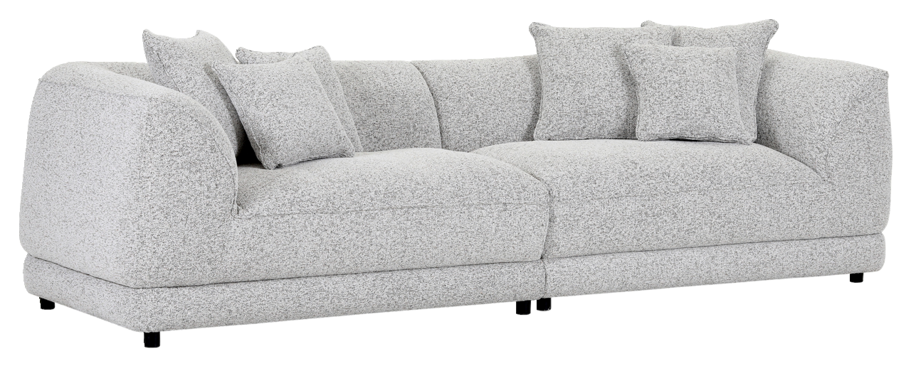 Großes, modernes Big-Sofa in hellgrauem Stoff mit mehreren Kissen, seitliche Perspektive