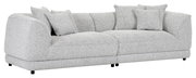 Großes, modernes Big-Sofa in hellgrauem Stoff mit mehreren Kissen, seitliche Perspektive