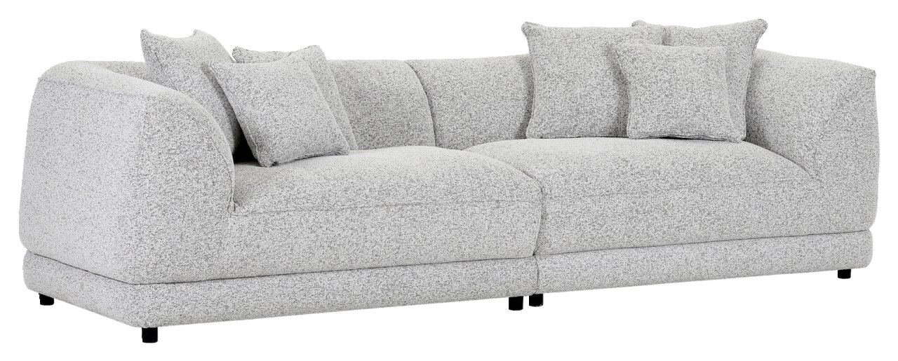 Großes, modernes Big-Sofa in hellgrauem Stoff mit mehreren Kissen, seitliche Perspektive