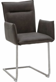 Moderner Freischwinger-Sessel in dunklem Stoffbezug mit Metallgestell, seitliche Perspektive