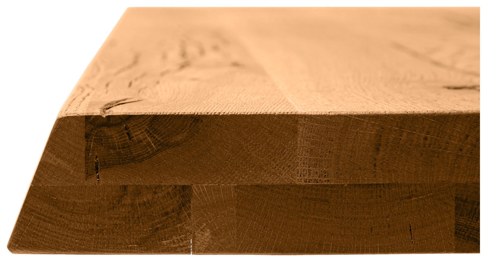Nahaufnahme einer massiven Holz-Tischplatte mit natürlicher Maserung, seitliche Perspektive