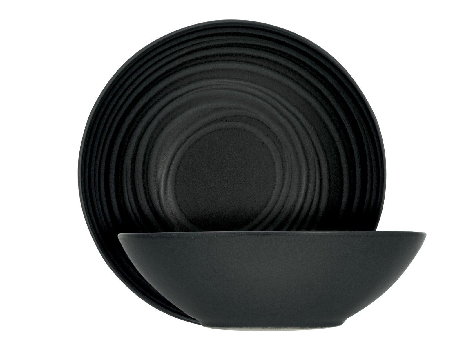 Creatable Salatschüssel 2-tlg LAVA STONE Schwarzes, mattes Geschirr-Set mit tiefem Teller/Schale im Vordergrund und geriffeltem flachem Teller im Hintergrund, Ansicht von vorne leicht seitlich.