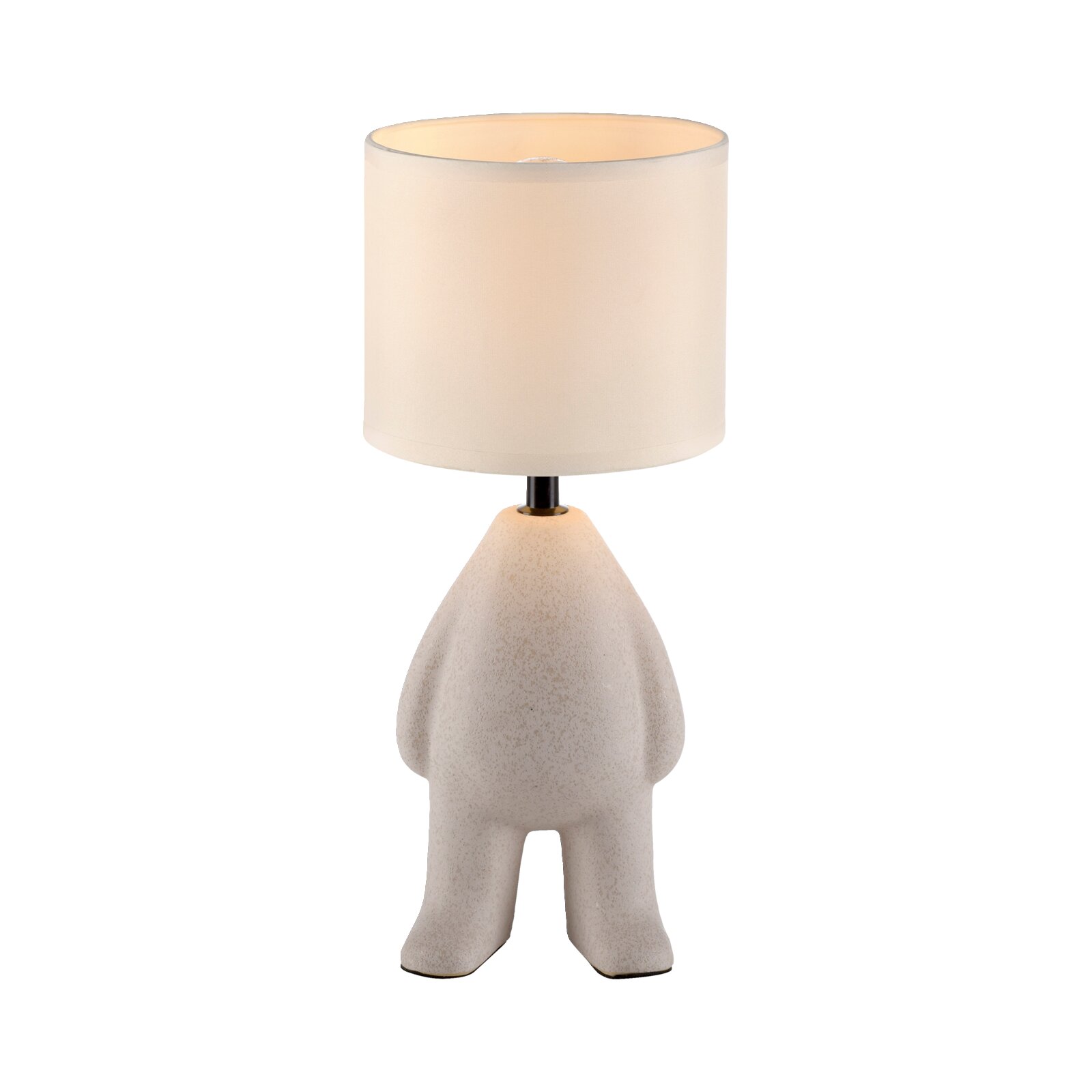 Moderne tafellamp met een cilindervormige, witte stoffen kap en een sculpturale, beige voet in de vorm van een figuur, van voren gezien in een licht bovenaanzicht